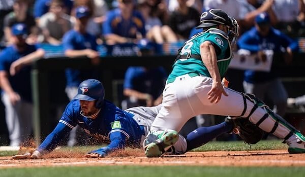 Instead of travelling to Seattle to watch the Blue Jays, some B.C. baseball fans are staying home