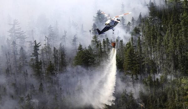 Strong winds fan Long Lake wildfire, more evacuations could be ordered
