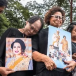 In pictures: Dressed in black, Thai citizens mourn former queen Sirikit’s death