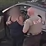 Woman choking while driving saved by officer