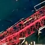 Crane collapse kills two people at construction site