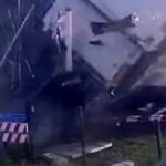 Train collides with truck at Dutch railroad crossing